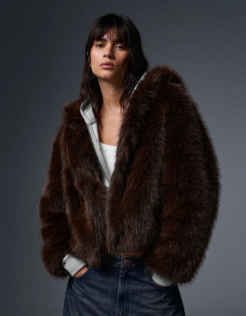 Blouson fourrure à capuche